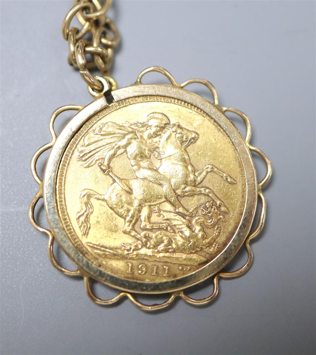 A George V 1911 gold sovereign, in yellow metal pendant mount, on a 9ct chain,